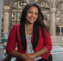 Pictured is intelligence graduate Barbara Arroyo. Photo by Chris Rolinson